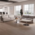 grey fabric sofa in reception area