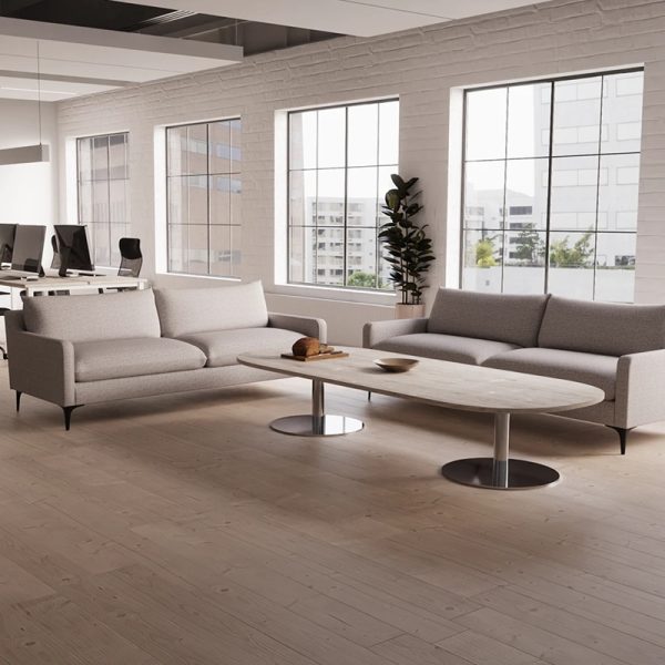 grey fabric sofa in reception area