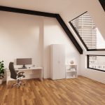 high back black leather executive office chair in home office with white office desk and cupboard