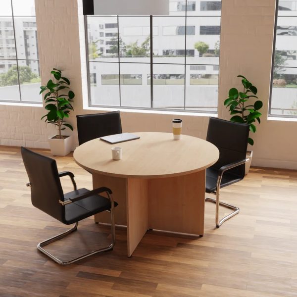 meeting chair in black leather with chrome cantilever frame around round beech meeting table