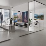 meeting chair in office with office desks and office chairs and glass partition walls