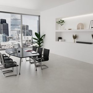 meeting chair in black leather with chrome cantilever frame around boardroom table with city view