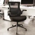 mesh back office chair by white office desk