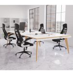 mesh back office chair black in office around meeting table.
