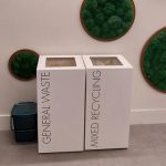 office recycling bins in row. Office waste bins white with black lettering