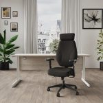 task operator chair in black fabric with arms and headrest in home office