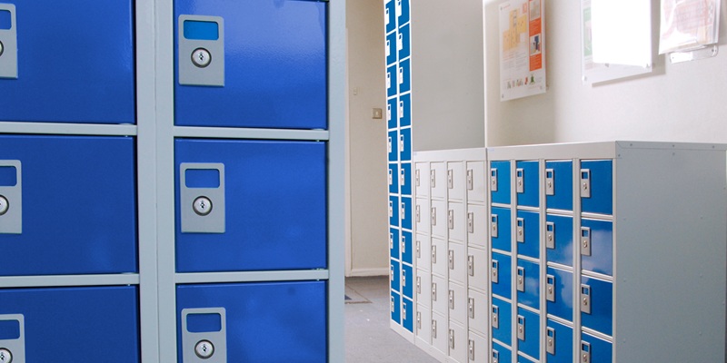 personal effects lockers in different sizes with blue or grey doors