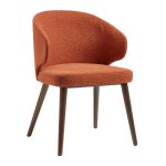 contemporary cafe chair in terracotta boucle fabric with dark wood legs