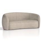 curved sofa in cream boucle fabric