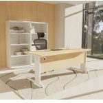 executive mesh chair with folding arms in sunny office behind desk