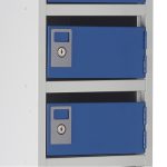 post box pigeon hole with grey carcass and blue lockable doors close up