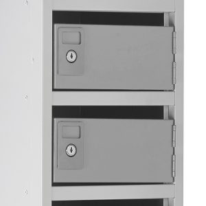 post box pigeon holes with grey carcass and doors close up