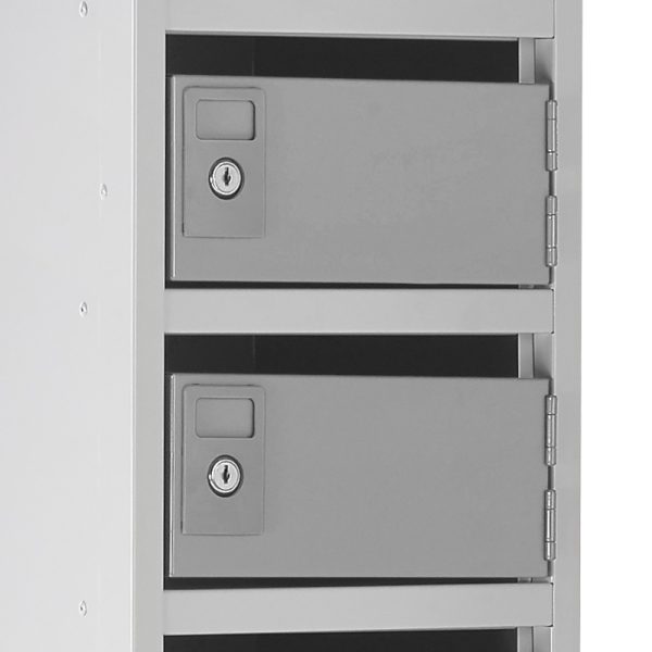 post box pigeon holes with grey carcass and doors close up