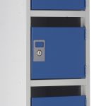 post box locker pigeon holes with blue doors close up