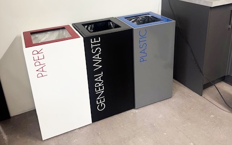 office recycling bins in a row