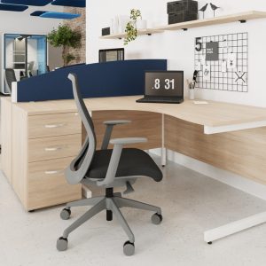 mesh back office chair in office in front of office desk