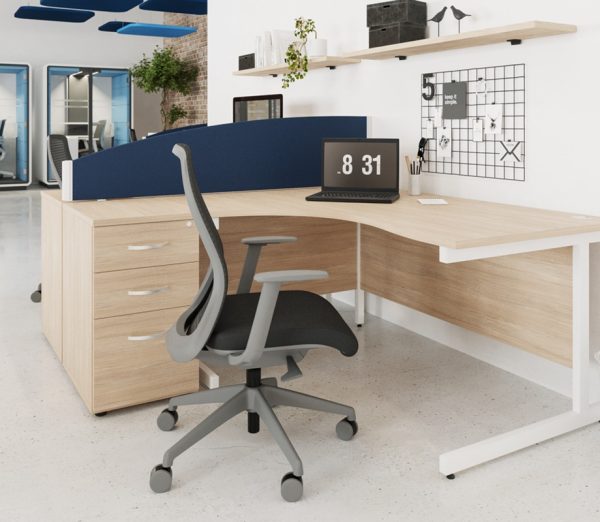 mesh back office chair in office in front of office desk