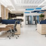 mesh back office chair with grey frame in an office