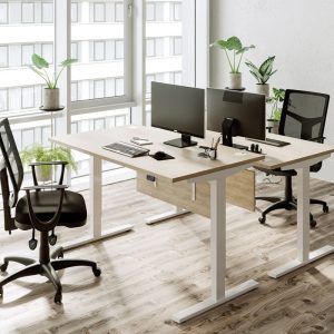 sit - stand desk in office
