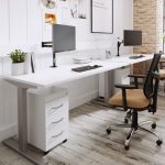 sit stand desk with white desk top and silver frame