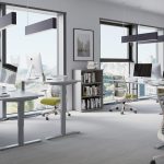 sit - stand desk in office