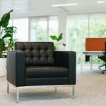 italian style black leather sofa in office