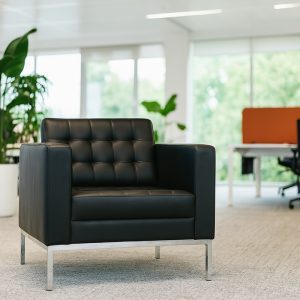 italian style black leather sofa in office