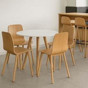 wooden cafe chairs around cafe table