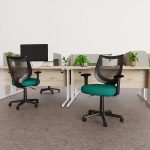 mesh office chair in office in front of office desks