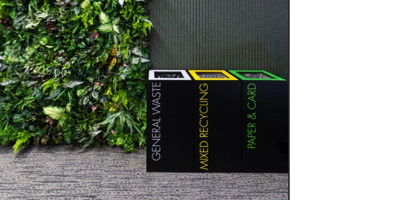 office recycling bins row of 3 with colour coded tops and lettering to indicate waste stream