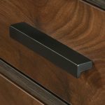 l shaped office desk close up of drawer handle