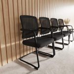 mesh back visitor chairs in row