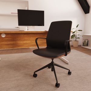 contemporary office chair black with walnut shell in office in front of a desk