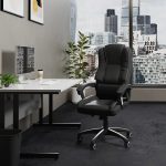 executive office chair black leather in office with city views
