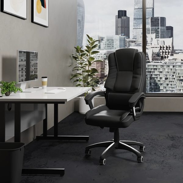 executive office chair black leather in office with city views