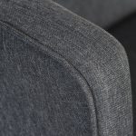 grey fabric accent chair close up