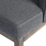 grey fabric accent chair close up