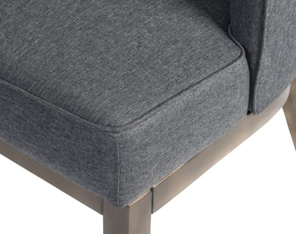 grey fabric accent chair close up