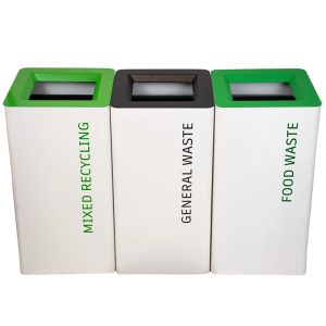office recycling bins in a row for different waste streams