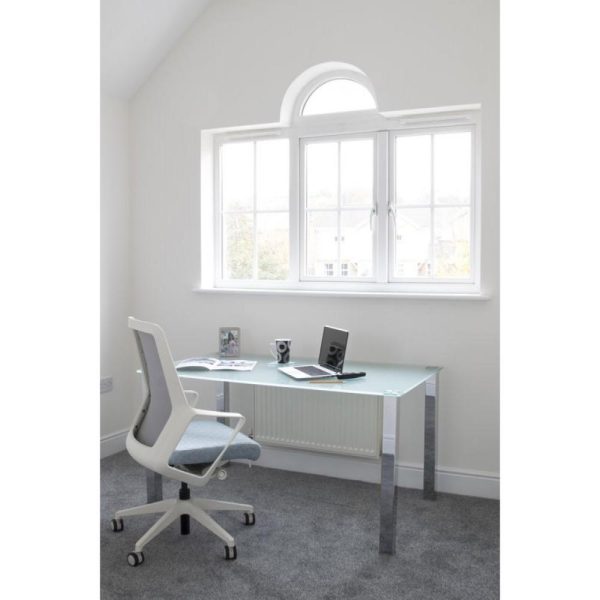 glass desk in room set with office chair