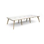 6 bench desks back to back in white desk top finish with oak edge detail and oak legs
