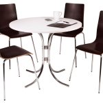 cafe table and chairs. White circular table with wenge chairs with chrome frame