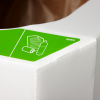 Recycling bin top showing green Mixed Recycling sticker