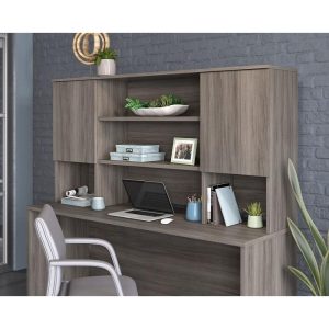 desk hutched filled with different accessories on office desk. In attractive elm finish. With office chair