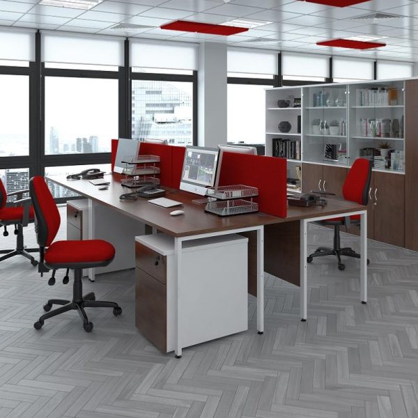 office roomset with office desks back to back with wlanut desk tops and silver H legs. Red fabric screens and matching office chairs