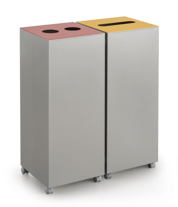 2 office recycling bins in silver on castors. One with red top with 2 circular cut outs and one yellow top with slot cut out