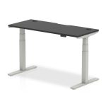 height adjustable desk with black desk top and silver legs