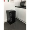 black office recycling bin with soft close top in a kitchen. white Food Waste lettering