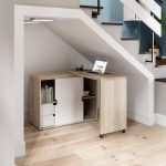 fold away cupboard desk in oak and white finish in understairs roomshot