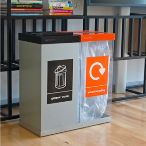 transparent office recycling bin with orange top and sticker Mixed Recycling and Silver office recycling bin with black top and sticker General Waste